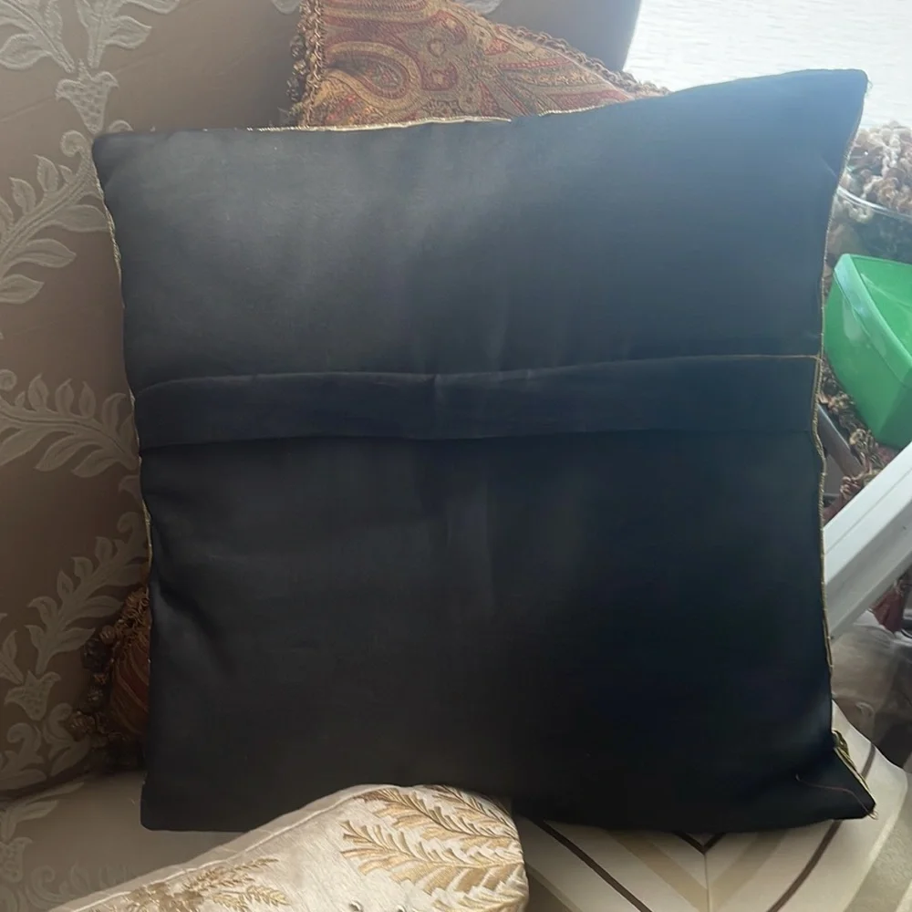 Elephant lovers this pillow is lovely exotic and quite intricate black silk back